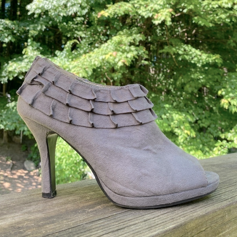 Rampage-gray ankle bootie 9.5 worn once. ruffle, zippered back